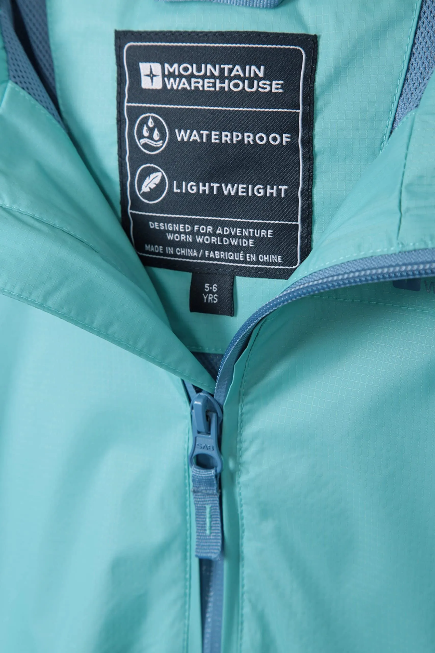 Mountain Warehouse Torrent Kids Waterproof Rain Jacket - Taped Seams Raincoat, Lightweight, Breathable, Girls & Boys Rainwear -Ideal for Autumn Winter, Travelling, Wet Weather Teal Kids Size 3-4 Years